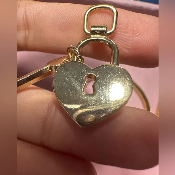 CHANEL heart and lock authentic charm on gold plated bracelet